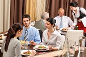 stock photo of business  - Business people enjoy lunch meal at restaurant management discussion - JPG 
