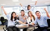 picture of group  - Successful business team with arms up at the office - JPG 