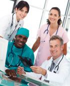 picture of medical doctors  - Group of doctors talking in an office about an X - JPG 
