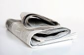 picture of newspaper  - pile of old newspaper on a white background - JPG 