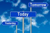 foto of yesterday  - Yesterday Tomorow Today traffic sign on a sky background - JPG 