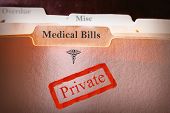 stock photo of medical  - tabbed folders with Medical Bills text and Private stamp - JPG 