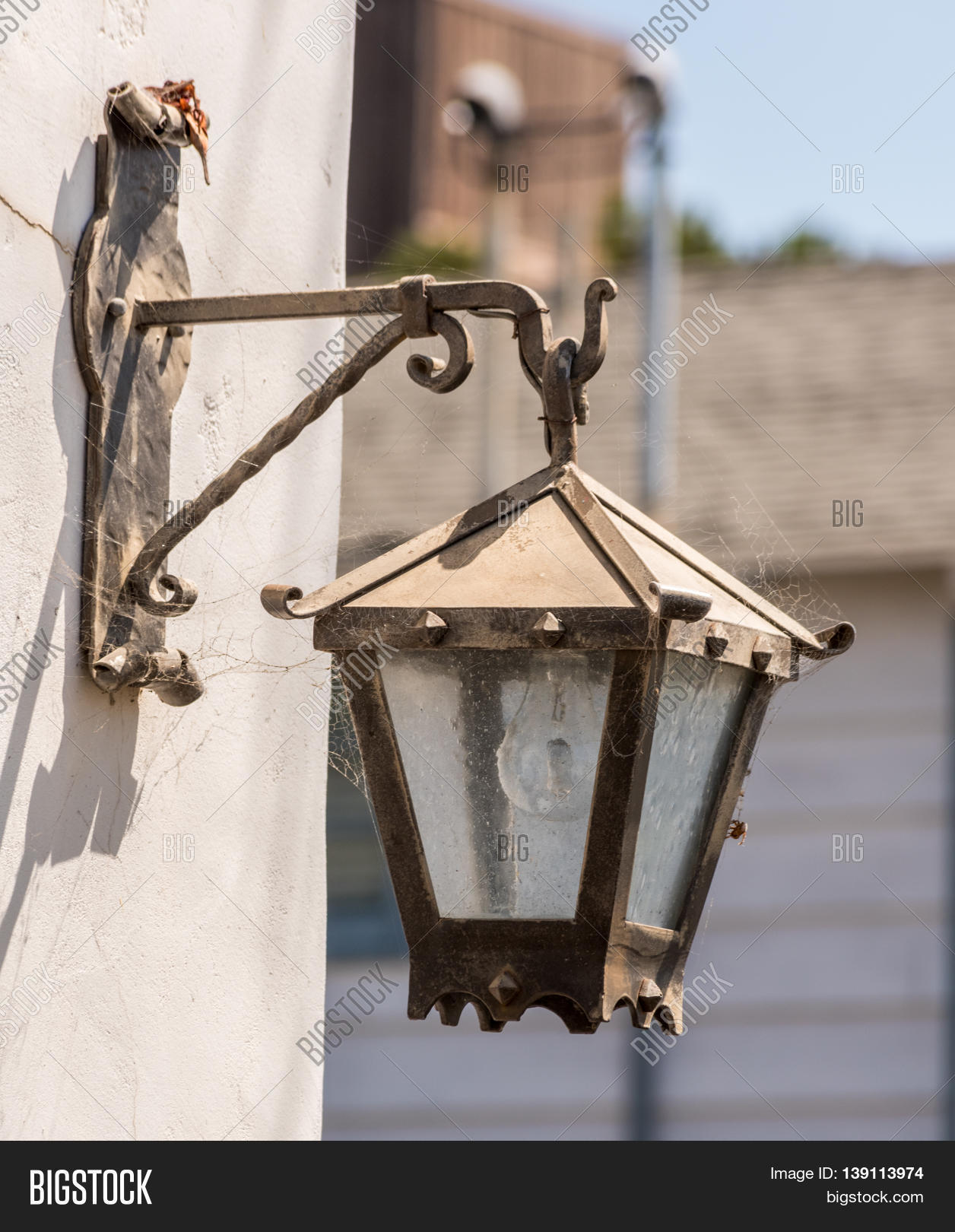 Old Street Light Fixture Mounted On A Wall White With Decorative Old Street Light Fixture Mounted On A Wall White With Decorative Details