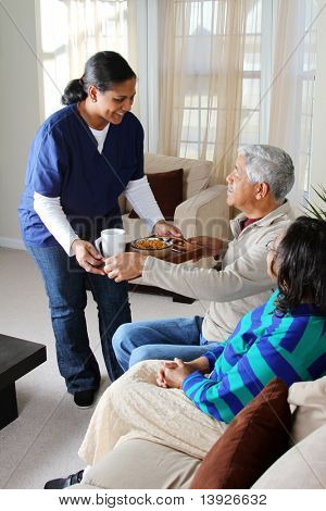 Picture or Photo of Home health care worker and an elderly couple