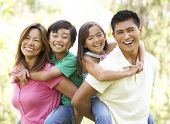 image of family  - Family Enjoying Day In Park - JPG 