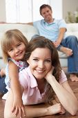 picture of home  - Portrait Of Happy Family Relaxing At Home - JPG 
