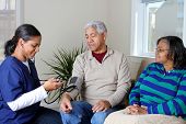 picture of home  - Home health care worker and an elderly couple - JPG 