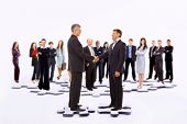 picture of business people  - Smiling business people and business shake - JPG 