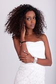 stock photo of hair  - Portrait of a young beautiful African American woman with curly hair - JPG 