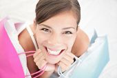 stock photo of woman  - Beautiful shopping woman happy holding shopping bags - JPG 