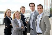 foto of business people  - Group of business people standing outside a trade fair - JPG 