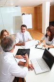 stock photo of business people  - Business people meeting around table - JPG 