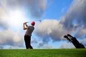 foto of golf  - Golfer playing on the idyllic golf course - JPG 