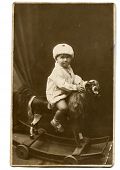 picture of horse  - Vintage photo of little girl on rocking horse  - JPG 