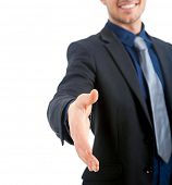 stock photo of handshake  - Businessman handshake isolated on white - JPG 