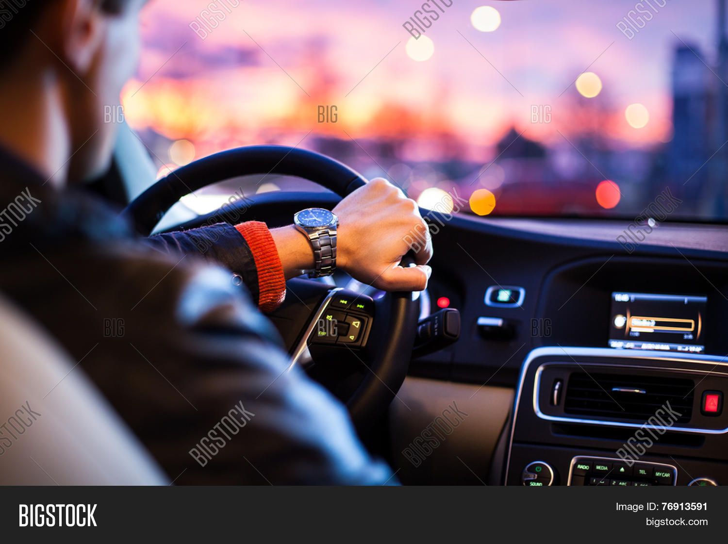 Woman Driving Car From Backseat Woman Driving Car From Backseat