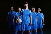 foto of group  - soccer players team group isolated on black background - JPG 