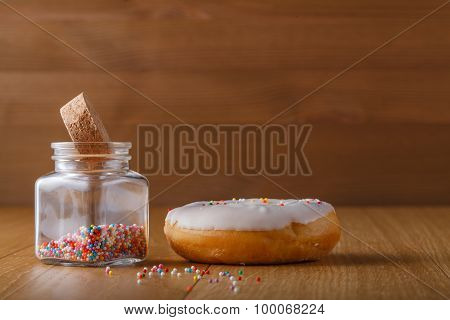 Donut On Table With Nonpareils
