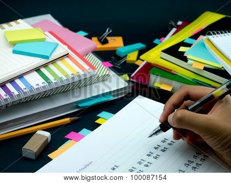 Learning New Language Writing Words Many Times On The Notebook; Mandarin