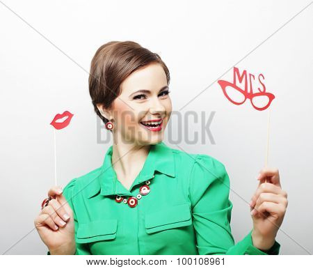 Attractive playful young woman ready for party - falce lips and glasses  