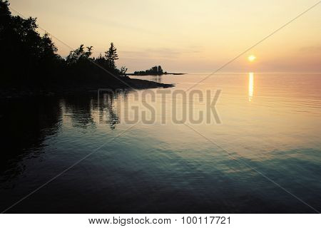 Ladoga Lake At Sunset. Aged Photo In Retro Style.