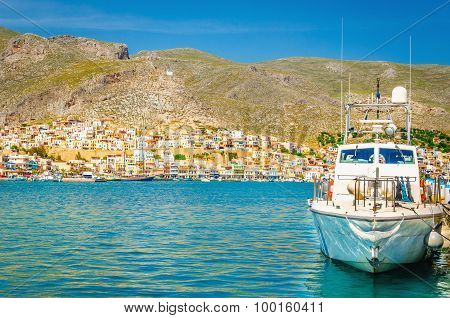 Blue fishermen's boat moored in small port, Greece