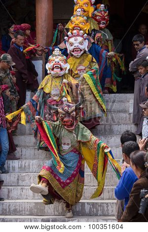 Tibetan Buddhist Lamas In The Mystical Masks Perform A Ritual Tsam Dance . Hemis Monastery, Ladakh,