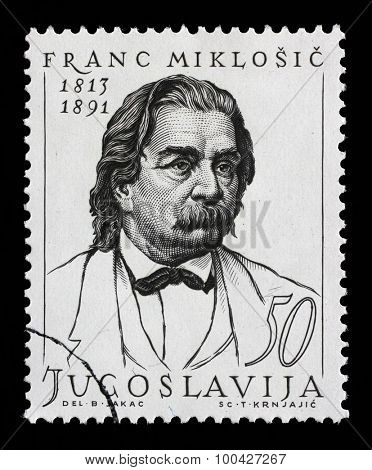 YUGOSLAVIA - CIRCA 1963: Stamp printed in Yugoslavia shows Franc Miklosic (Franz von Miklosich) (November 29, 1813 - March 7, 1891), Slovenian philologist and Slavist, circa 1963