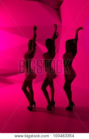Silhouettes Of Dancing Girls