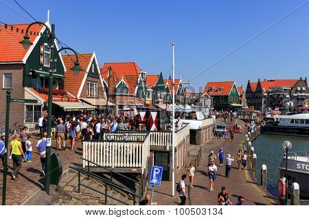 Tourists and locals at Volendam's boardwalk