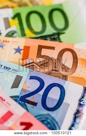 many different euro bills. symbolic photo for wealth and investment.