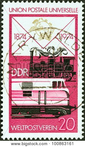 GERMAN DEMOCRATIC REPUBLIC - CIRCA 1974: Stamp shows Steam and diesel railway locomotives