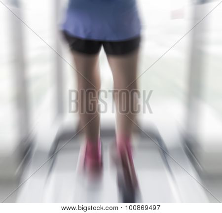 Zoom Burst Radial Blur Of Woman Running In Gym