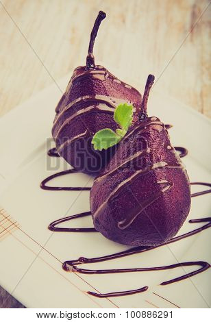 Vintage Photo Of Pears Cooked In Red Wine With Chocolate