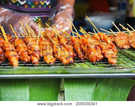 Thailand treditionlal food Thailand street food pork are grill with sweet sauce. They are call 