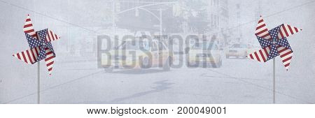Digital composite of USA wind catchers in front of city