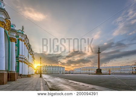 The Alexandrian Pillar and the Palace Square in St. Petersburg in the Rays of the Rising Sun