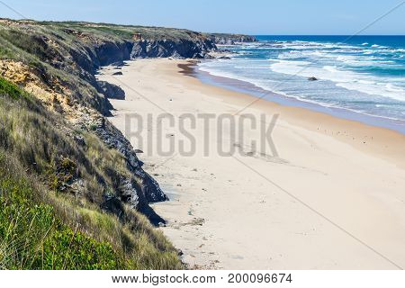 Beach And Cliffs In Almograve