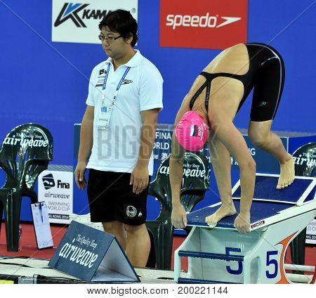 Hong Kong China - Oct 30 2016. Olympian and world champion swimmer Yulia YEFIMOVA (RUS) at the start in Women's Breaststroke 50m Final. FINA Swimming World Cup Victoria Park Swimming Pool.