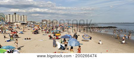 BROOKLYN NEW YORK USA - AUGUST 16: Wide view of beach during summer at Coney Island. Taken August 16 2017 in New York.