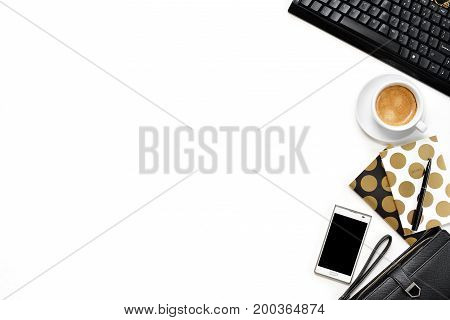 Flat Lay Photo Of Office White Desk With Tablet, Keyboard And Gold Notebook Copy Space Background