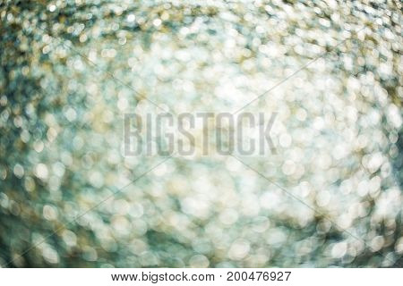 Colorful bokeh background. abstract blurred circles in nature colors. Copyspace for design and text