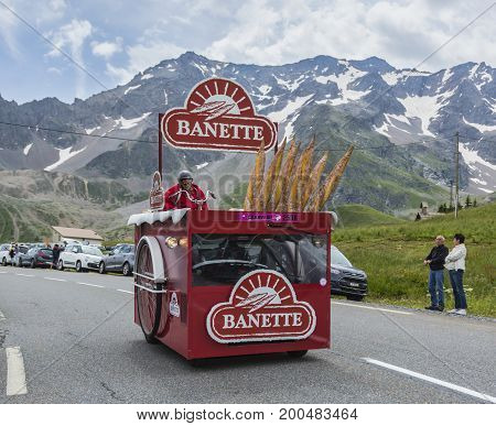 Col du Lautaret France - July 19 2014: The vehicle of Banette during the passing of the advertising caravan on mountain pass Lautaret during the stage 14 of Le Tour de France 2014. Before the appearance of the cyclists there is a caravan of advertising ca