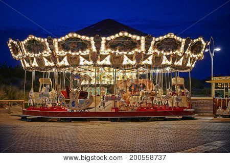 Merry-go-round On Belgian Seaside By Night