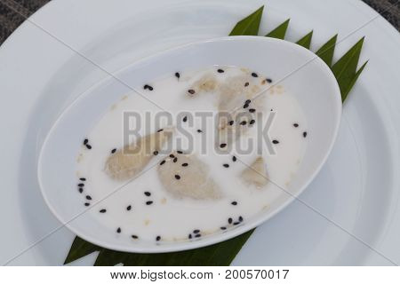 Banana Cooked in Coconut Milk (Kluay Buat Chi)Thai desserts made from banana and coconut milk.Sweet taste it mellow.