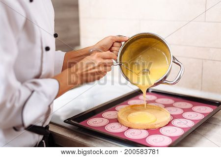 The Confectioner Fills The Lemon Pie With Stuffing.
