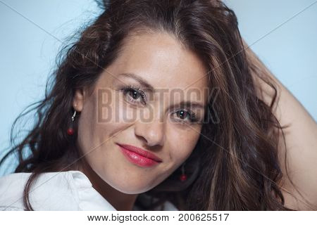 Portrait of attractive brunette caucasian smiling  woman