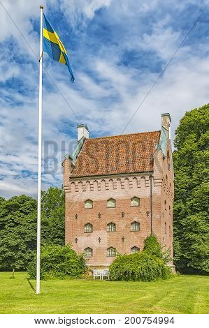 An image of the medieval building of Borjes tower next to Borgeby castle in the Skane region of Sweden.