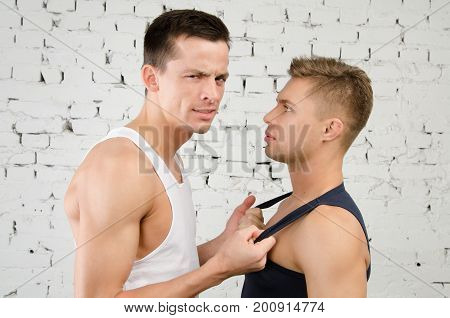 Quarrels.  Love and relationships. Two sexy guys.