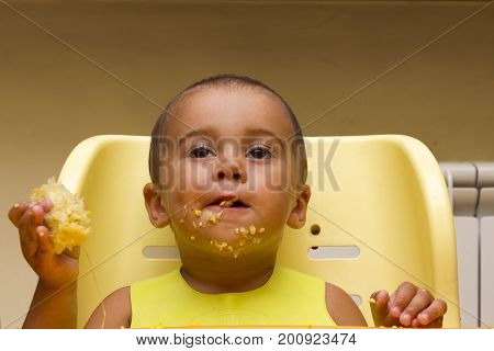 Happy Little Boy Holding A Corn. Concept Of Healthy Food.